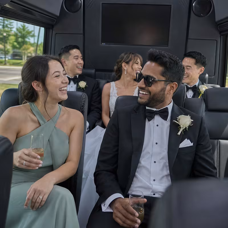 Black Mercedes Sprinter van staged for an Garland Wedding Transportation group